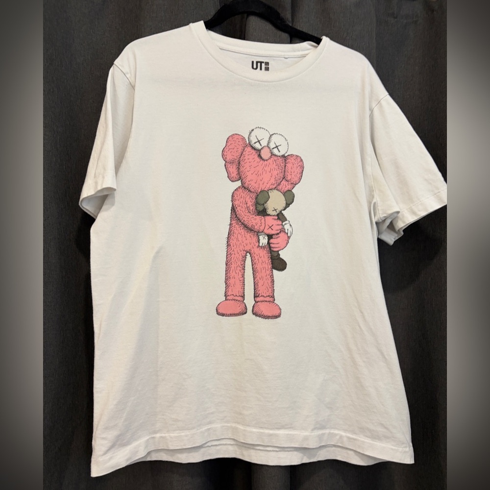 KAWS x Uniqlo Pink BFF Tee in white cotton.